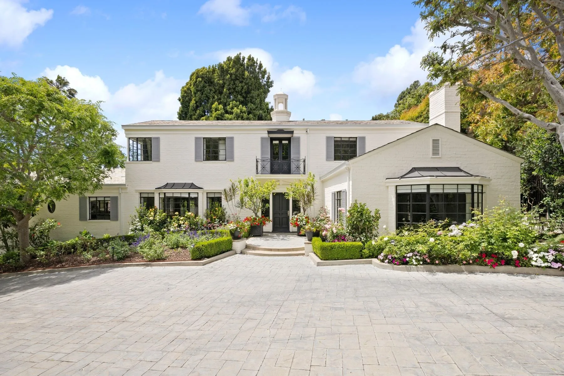 Beverly Hills white colonial luxury home with garden